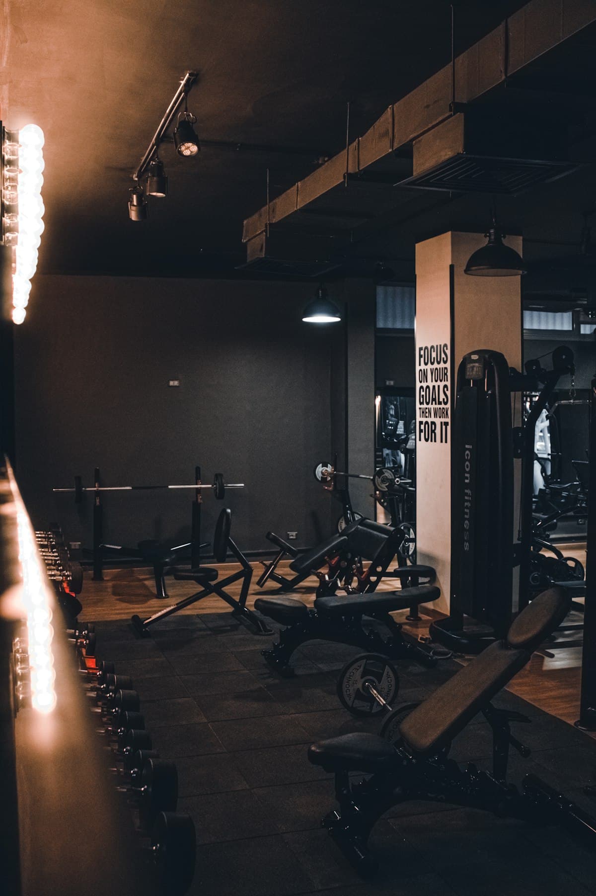 Boutique gym members training in a modern fitness studio